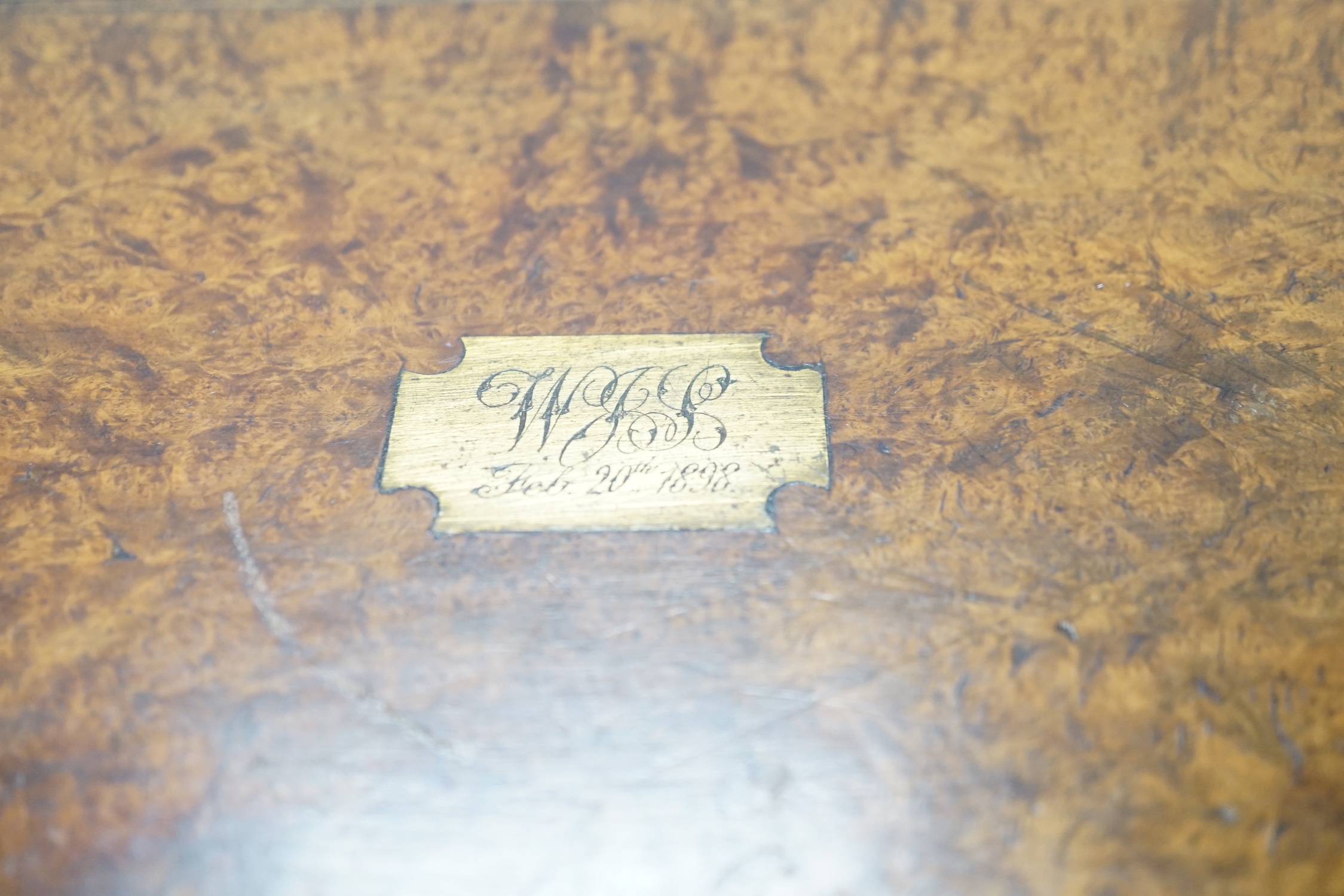 A 19th century brass inlaid burr walnut writing box, 34cm wide